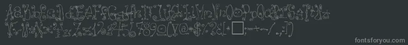 Danzin-fontti – harmaat kirjasimet mustalla taustalla