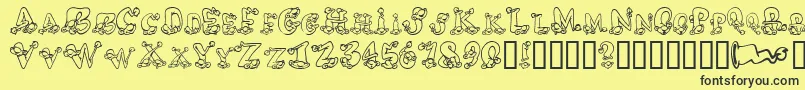 フォントAlphaElfin – 黒い文字の黄色い背景