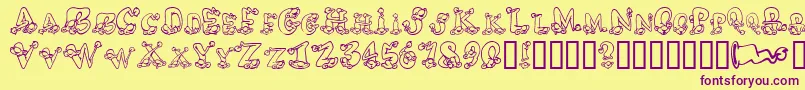 AlphaElfin Font – Purple Fonts on Yellow Background