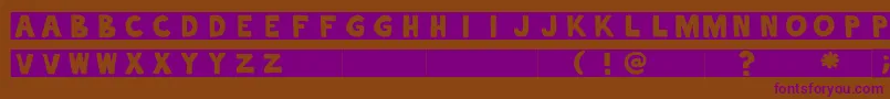 alphaletras Font – Purple Fonts on Brown Background