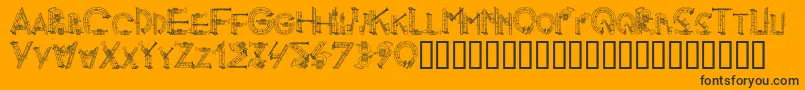Więcej informacji o czcionce AlphaMusicMan Czcionka AlphaMusicMan – czarne czcionki na pomarańczowym tle