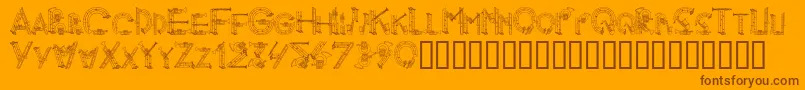 AlphaMusicMan Font – Brown Fonts on Orange Background