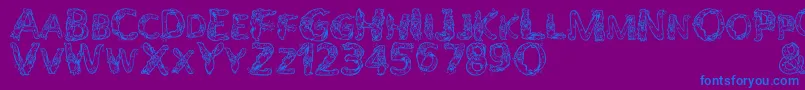 AlphaWizard-Schriftart – Blaue Schriften auf violettem Hintergrund