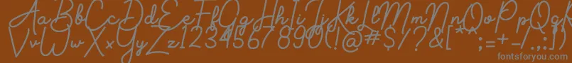 More about Aluria Font Aluria Font – Gray Fonts on Brown Background