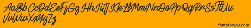 Alvaro FREE Font – Black Fonts on Orange Background