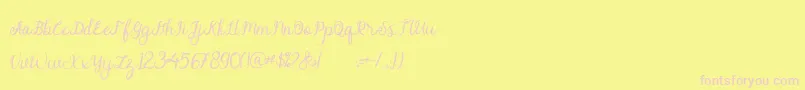 alymhela-Schriftart – Rosa Schriften auf gelbem Hintergrund