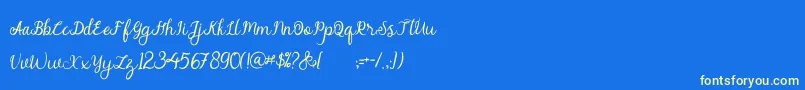 フォントalymhela – 黄色の文字、青い背景