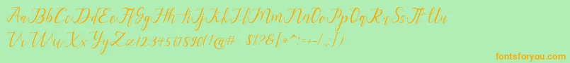 alysa scrip Font – Orange Fonts on Green Background