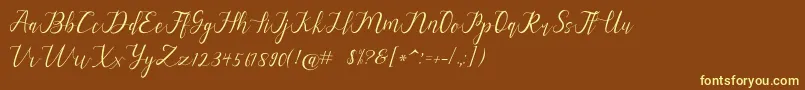 alysa scrip-fontti – keltaiset fontit ruskealla taustalla
