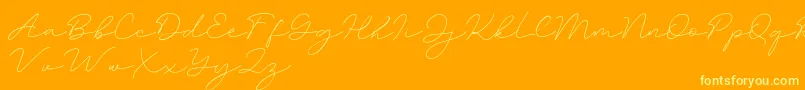 Amalina-Schriftart – Gelbe Schriften auf orangefarbenem Hintergrund