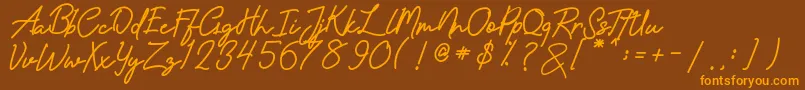 amandasignature-Schriftart – Orangefarbene Schriften auf braunem Hintergrund