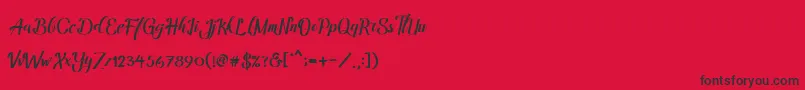 フォントAmandella – 赤い背景に黒い文字
