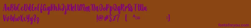 Amanise-Schriftart – Violette Schriften auf braunem Hintergrund