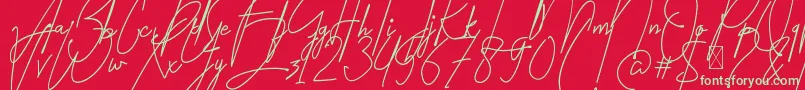 Amartans Signature Reguler-Schriftart – Grüne Schriften auf rotem Hintergrund