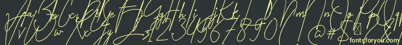 フォントAmartans Signature Reguler – 黒い背景に黄色の文字