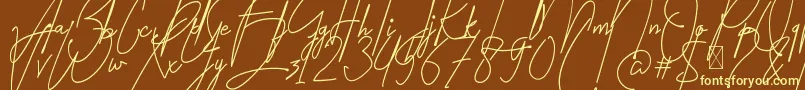 Amartans Signature Reguler Font – Yellow Fonts on Brown Background