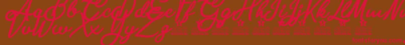 Ambar Pearl Personal Use-Schriftart – Rote Schriften auf braunem Hintergrund