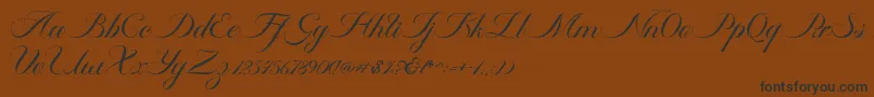 Ambergris Script Free Personal-fontti – mustat fontit ruskealla taustalla