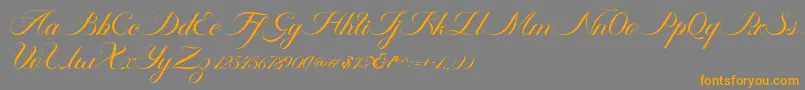 Ambergris Script Free Personal-Schriftart – Orangefarbene Schriften auf grauem Hintergrund