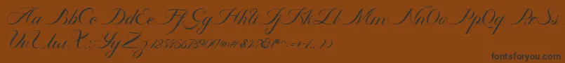 Czcionka Ambergris Script Free Personal – czarne czcionki na brązowym tle