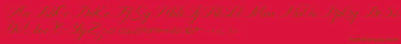 Fonte Ambergris Script Free Personal – fontes marrons em um fundo vermelho