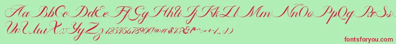 Ambergris Script Free Personal-fontti – punaiset fontit vihreällä taustalla