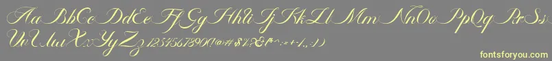 Fonte Ambergris Script Free Personal – fontes amarelas em um fundo cinza