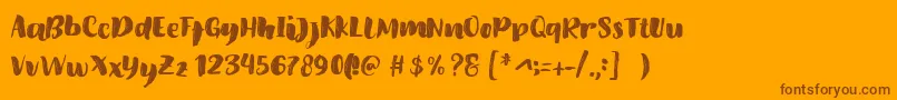 Fonte Amel Brush Font – fontes marrons em um fundo laranja