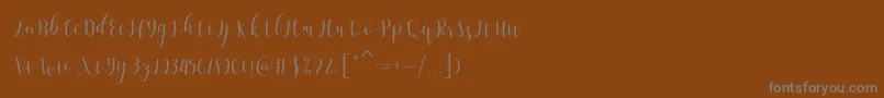 Шрифт Amelisa – серые шрифты на коричневом фоне
