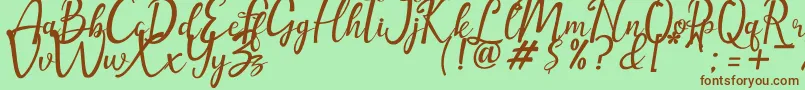 amellia-Schriftart – Braune Schriften auf grünem Hintergrund