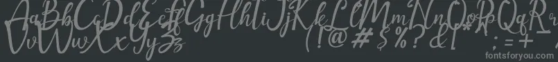 amellia-Schriftart – Graue Schriften auf schwarzem Hintergrund