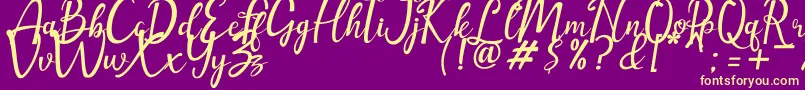 amellia Font – Yellow Fonts on Purple Background