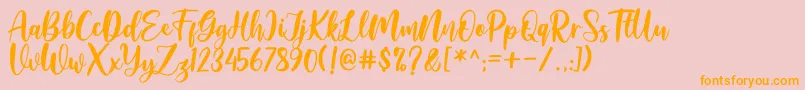 Amelya Font – Orange Fonts on Pink Background