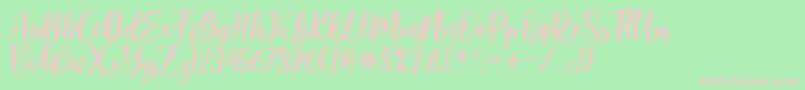 Amelya Font – Pink Fonts on Green Background