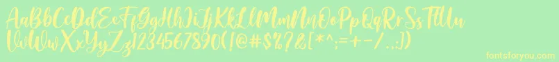 Amelya Font – Yellow Fonts on Green Background