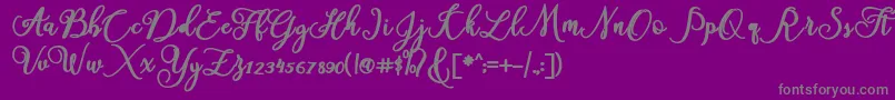 America-fontti – harmaat kirjasimet violetilla taustalla