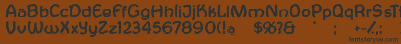 フォントAntroposofia – 黒い文字が茶色の背景にあります