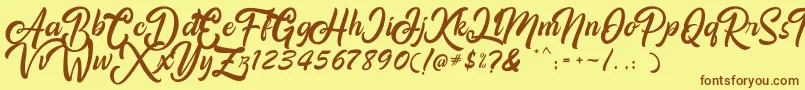 Amigos Font – Brown Fonts on Yellow Background