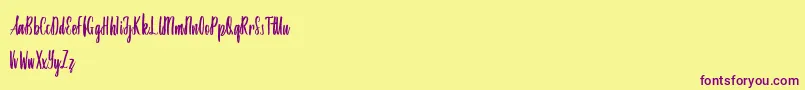 Amindinah Font – Purple Fonts on Yellow Background