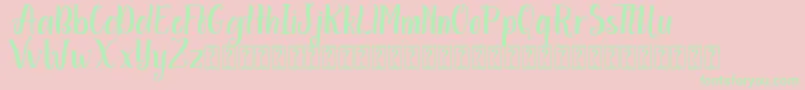 Aminetta free-Schriftart – Grüne Schriften auf rosa Hintergrund