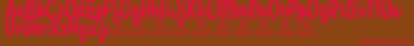 Amore Mio Personal Use Font – Red Fonts on Brown Background