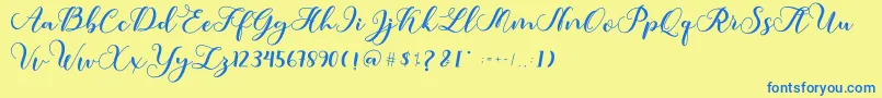 フォントAmotim – 青い文字が黄色の背景にあります。