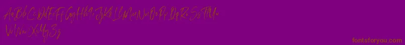 Amourist-Schriftart – Braune Schriften auf violettem Hintergrund