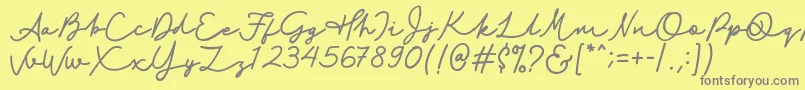 フォントAmstrong – 黄色の背景に灰色の文字