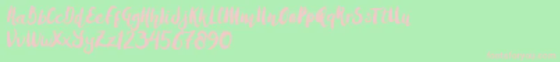 Amulhed brush   Demo-Schriftart – Rosa Schriften auf grünem Hintergrund