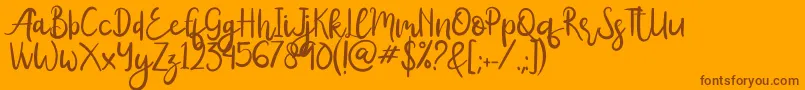 Czcionka Amy – brązowe czcionki na pomarańczowym tle