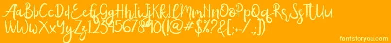 More about Amy Font Amy Font – Yellow Fonts on Orange Background