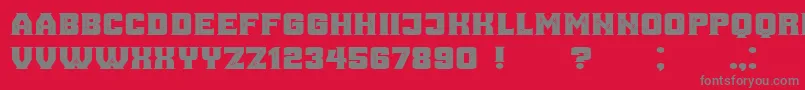 フォントAnaGrunged – 赤い背景に灰色の文字