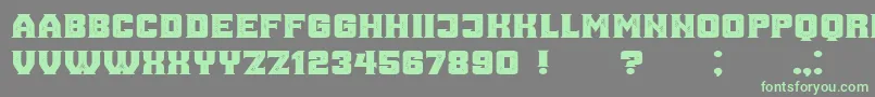 AnaGrunged-Schriftart – Grüne Schriften auf grauem Hintergrund
