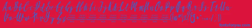 MollucaItalicFree Font – Blue Fonts on Red Background